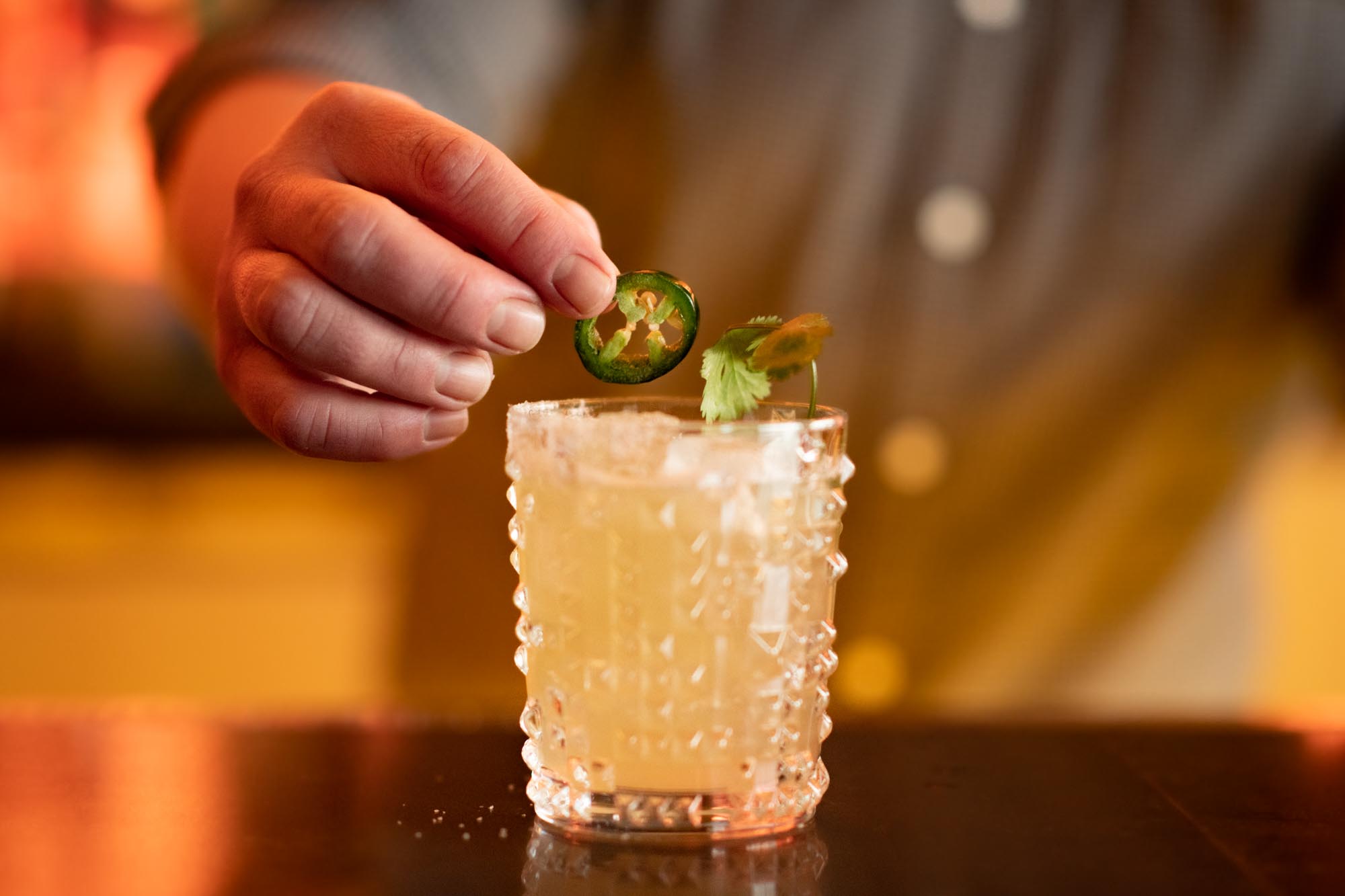 Cocktail with Jalapeño garnish